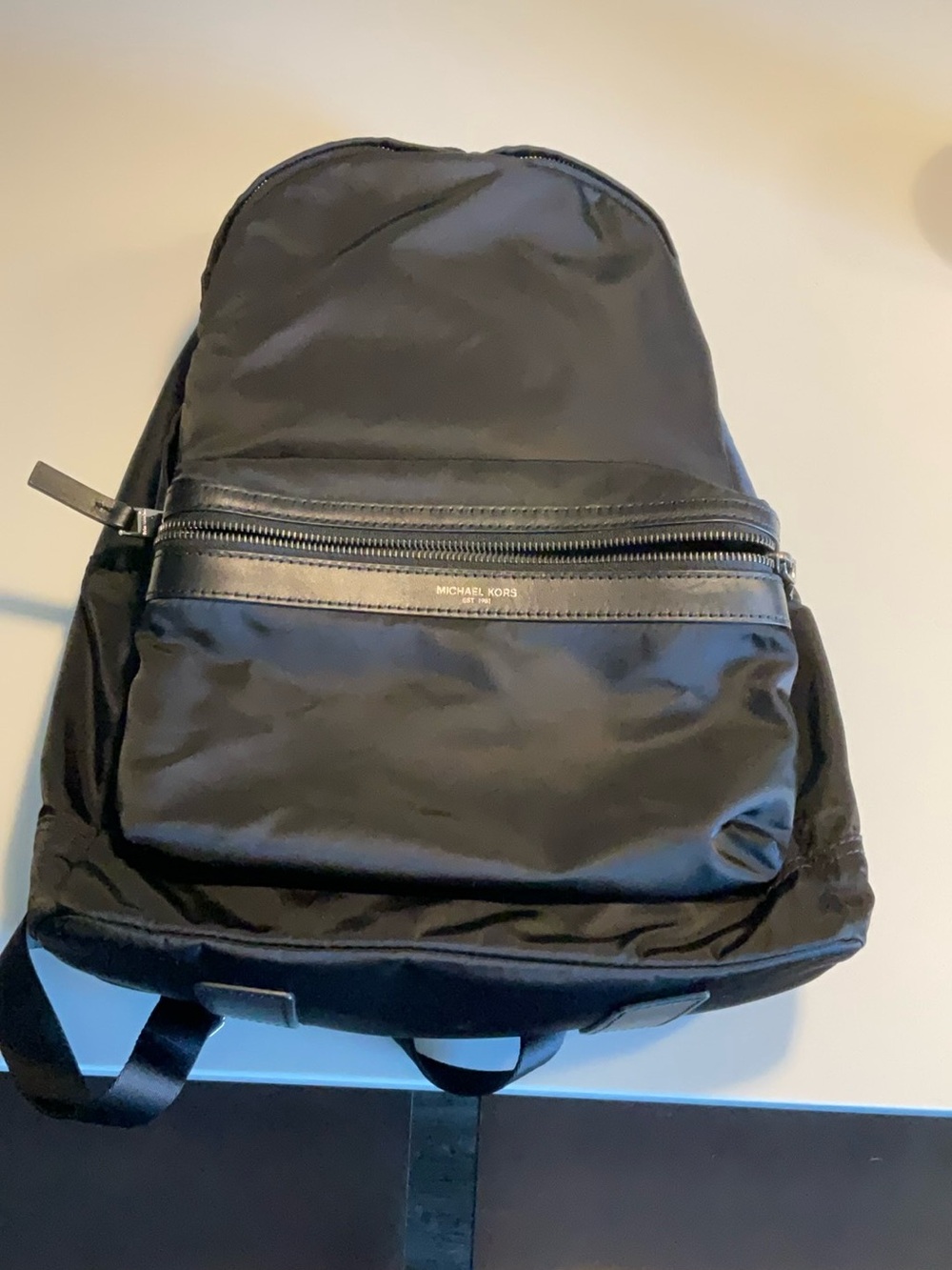 Black Michael Kors Kent Backpack. Silver hardware